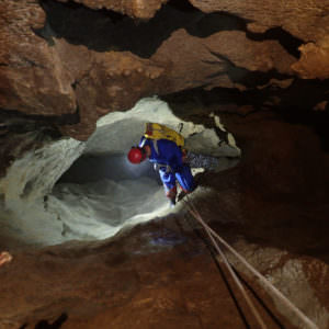 Abseiling in caving during the Hayau-Bouhadère underground crossing