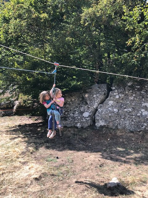 Tyrolean traverse between the boulders at POnt de Camps in the Pyrenees National Park