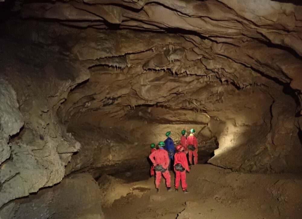 Caving in the Balagué cave in the Pyrenees